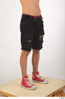 Colin black shorts clothing leg lower body red shoes 0008.jpg